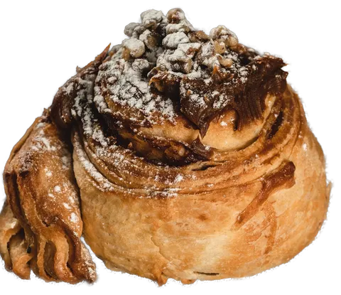 Rol de Nutella en espiral, con trocitos y azúcar glass encima
