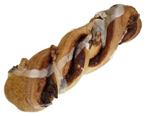 Trenza de pan con relleno oscuro y líneas de glaseado